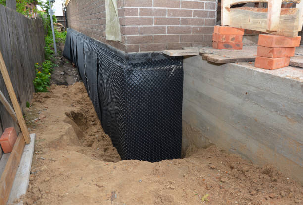Happy homeowners after waterproofing job in Southgate